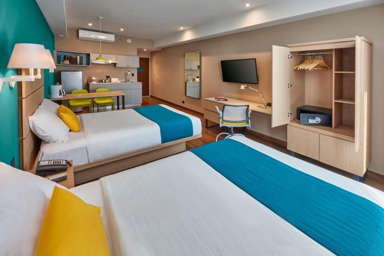 City Express Suites Habitacion