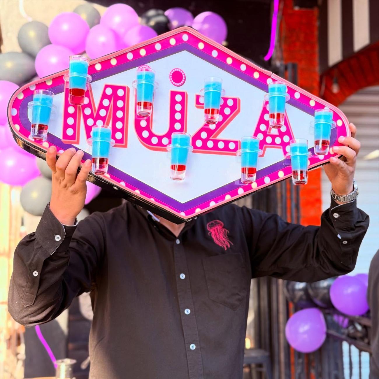 muza shots